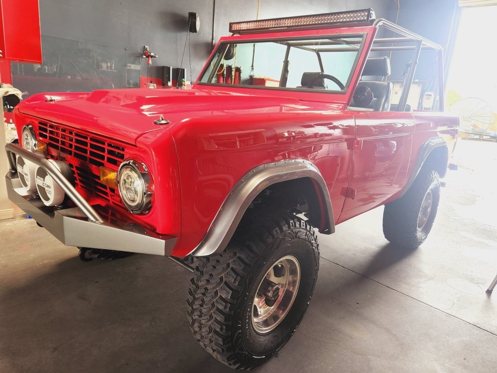 Classic red Ford Bronco after restoration detailing