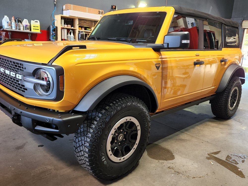 Orange Ford Bronco at the shop