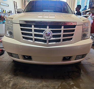 Cadillac Escalade front end in the shop for detailing