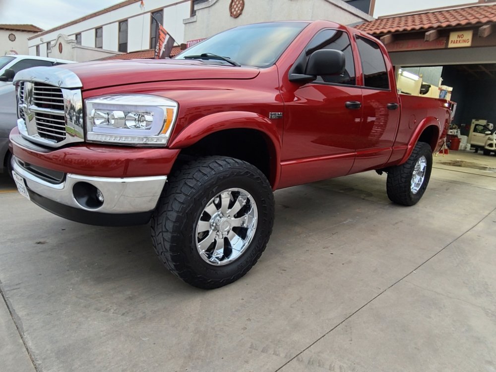 Red Dodge Ram pickup at the shop