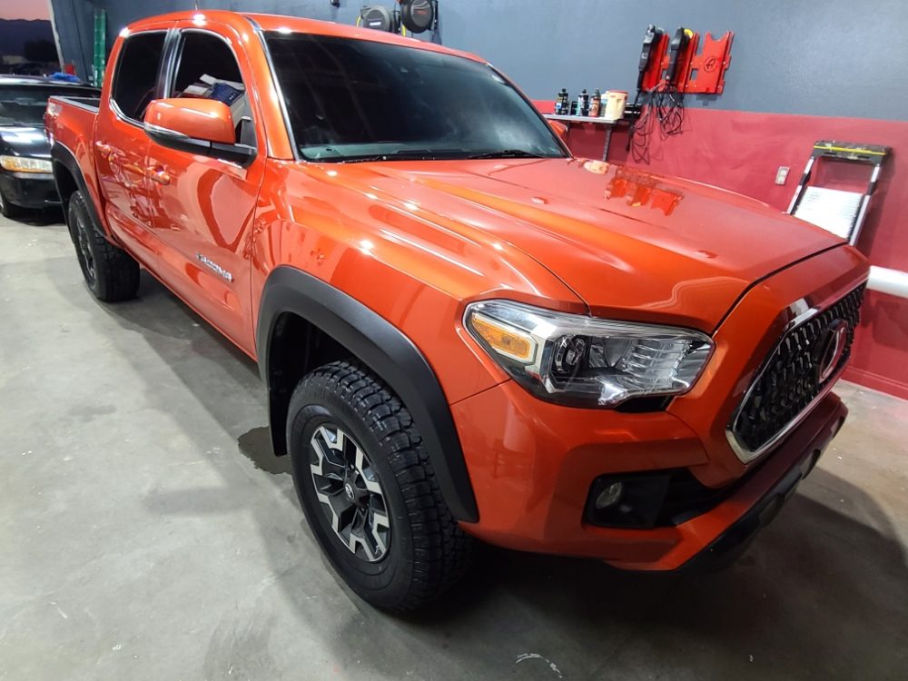 Orange Toyota Tacoma after detailing