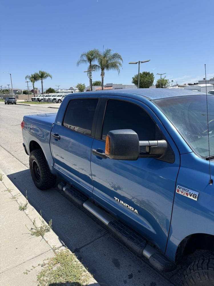 Vehicle with freshly installed window tint at the shop