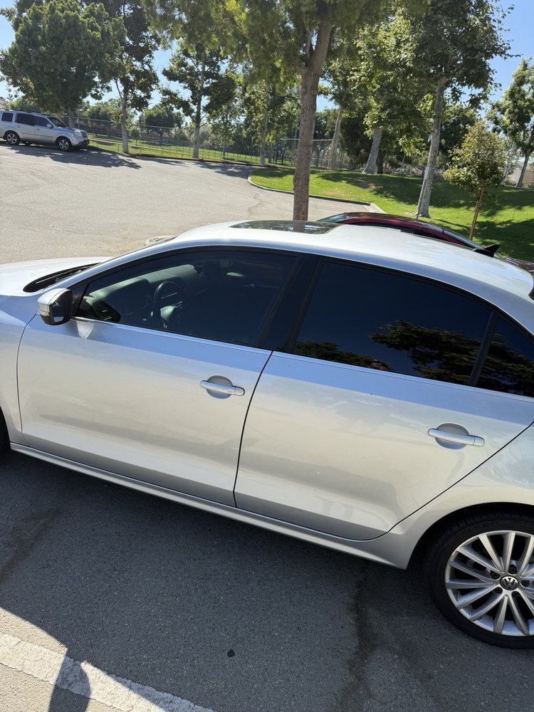 Vehicle with freshly installed window tint at the shop