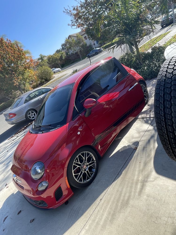 Red hatchback freshly detailed