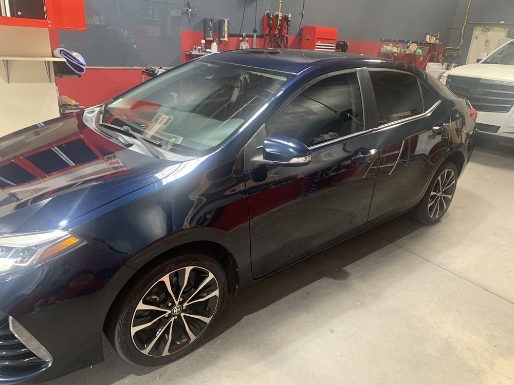 Black sedan with tinted windows