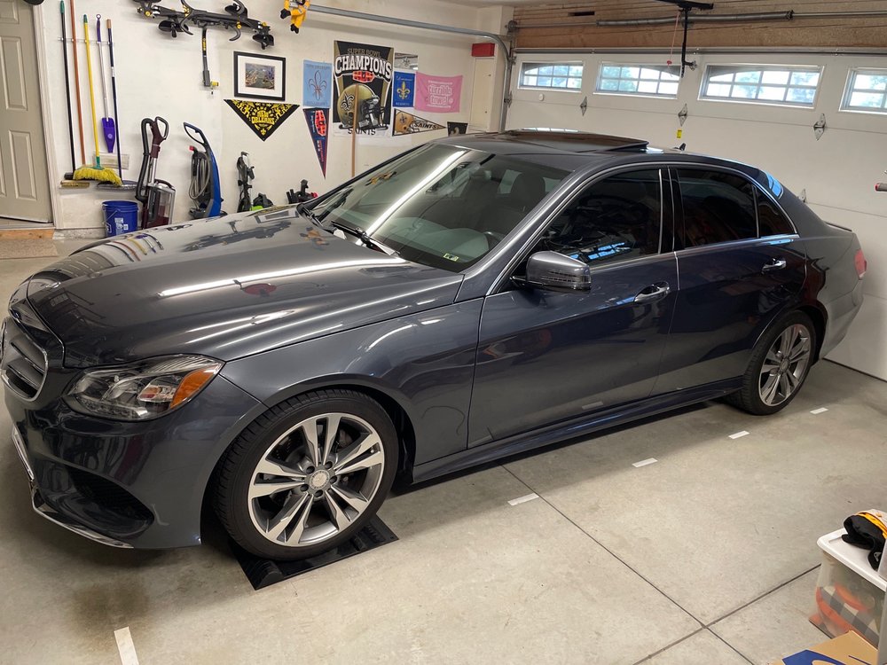 Vehicle with freshly installed window tint at the shop