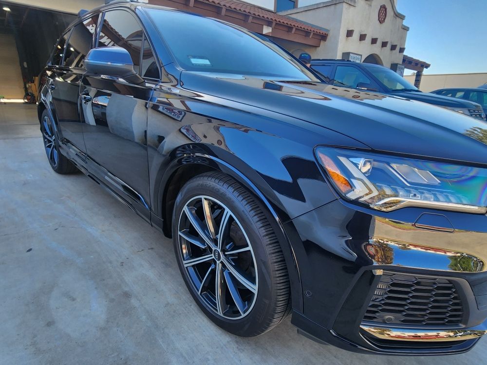 Vehicle with freshly installed window tint at the shop