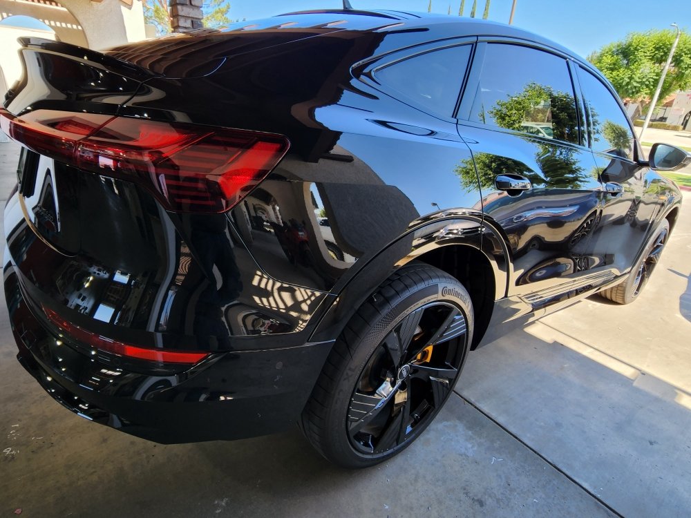 Vehicle with freshly installed window tint at the shop
