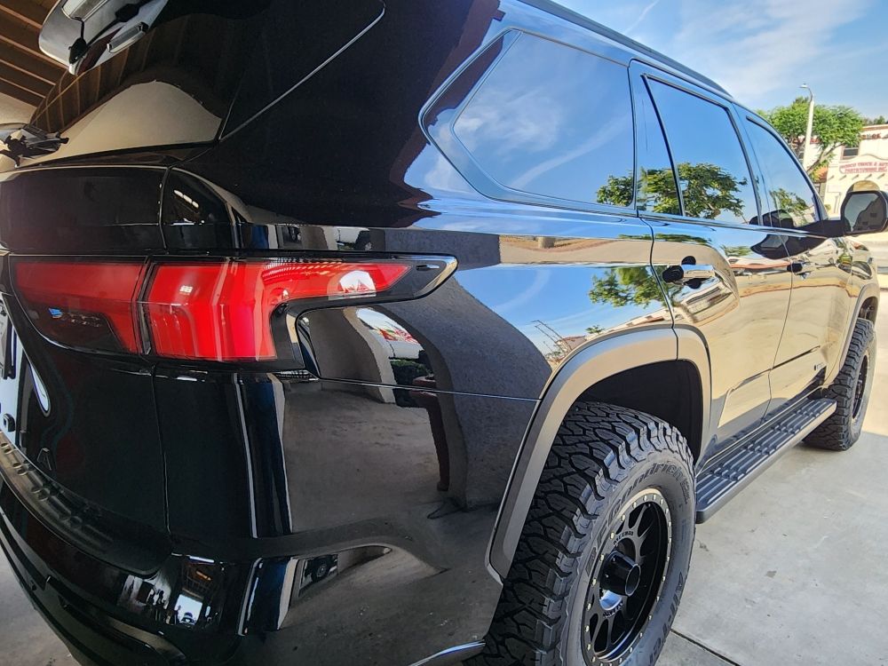 Vehicle with freshly installed window tint at the shop