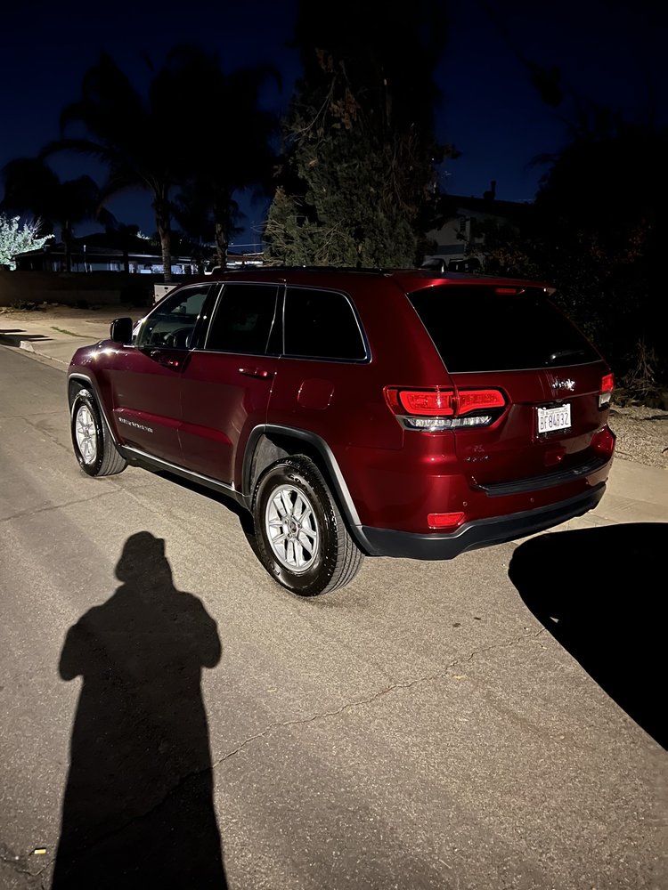 Dark red Jeep Grand Cherokee