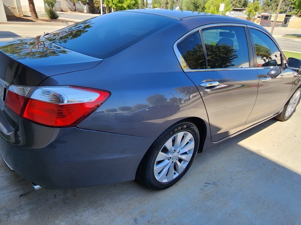 Blue sedan with tinted glass