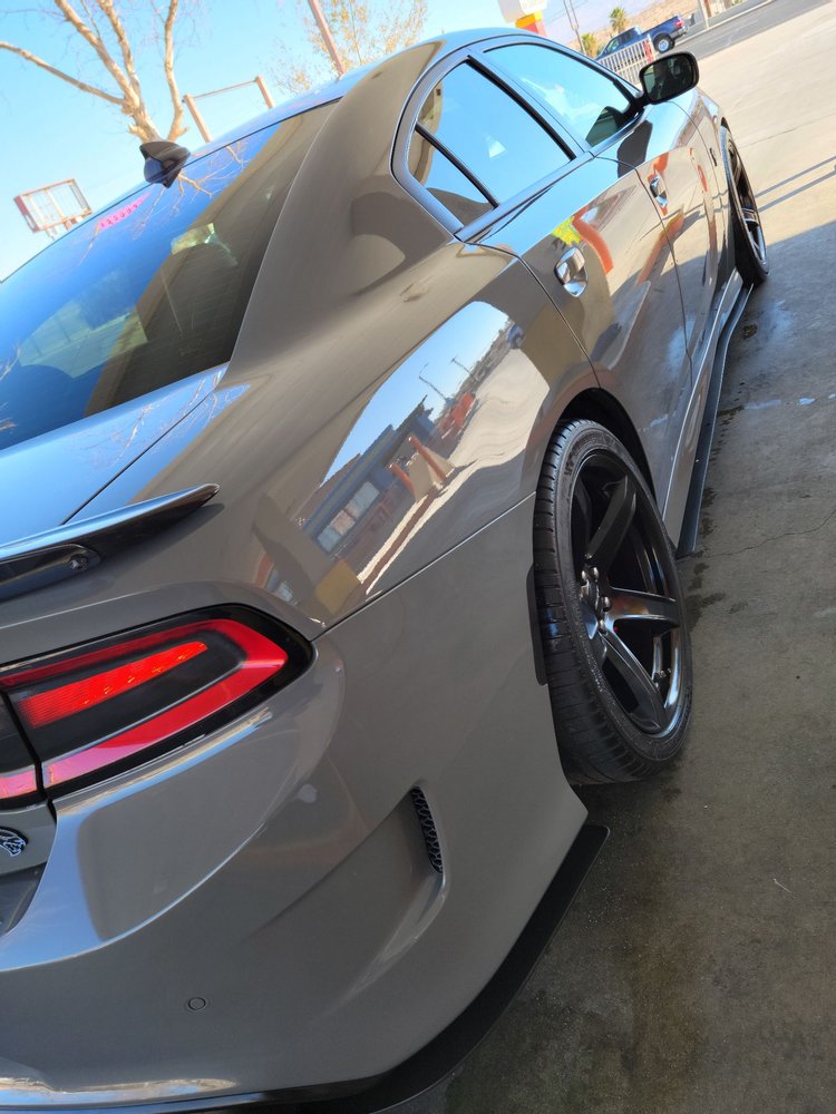 Vehicle with freshly installed window tint at the shop