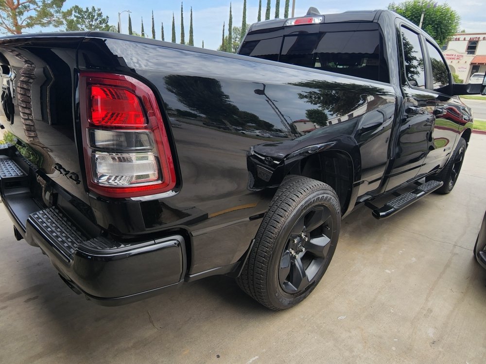 Vehicle with freshly installed window tint at the shop