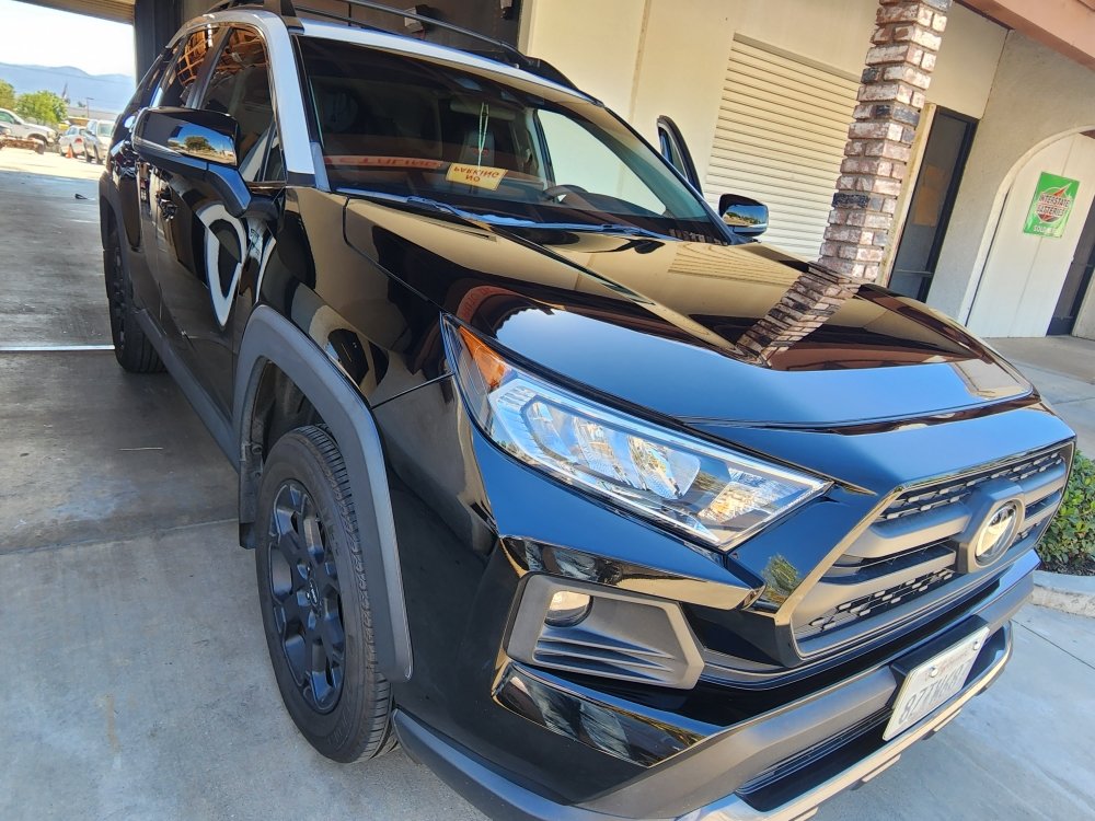 Vehicle with freshly installed window tint at the shop