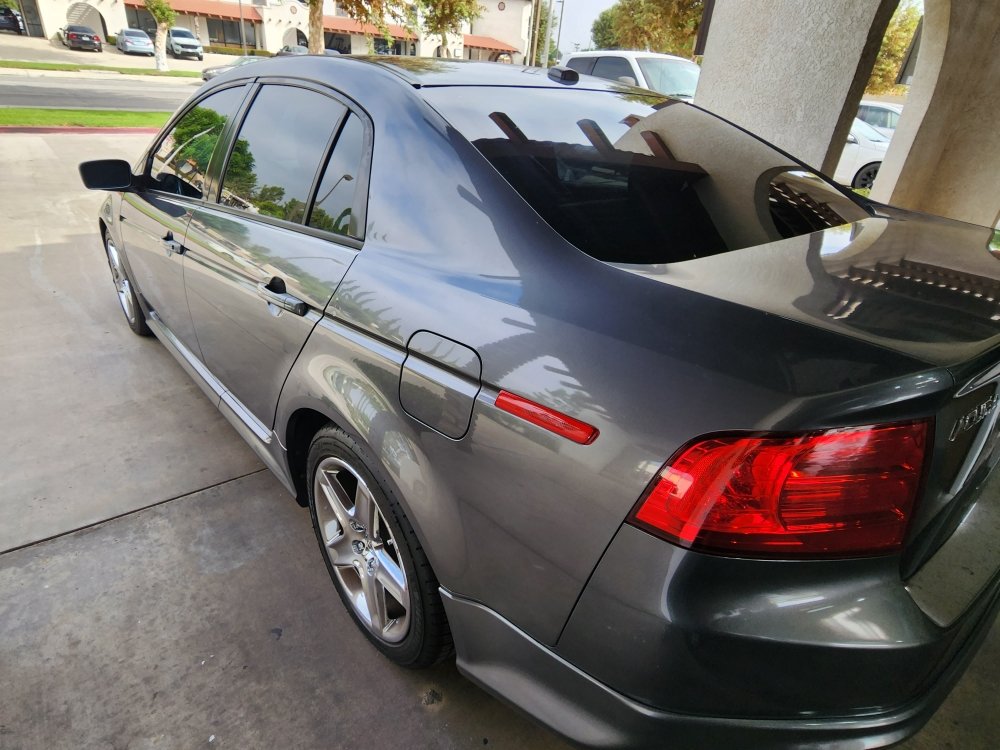 Vehicle with freshly installed window tint at the shop
