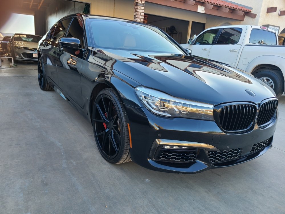 Vehicle with freshly installed window tint at the shop