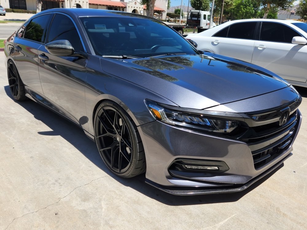 Gray Honda Accord with black wheels and a front lip after detail
