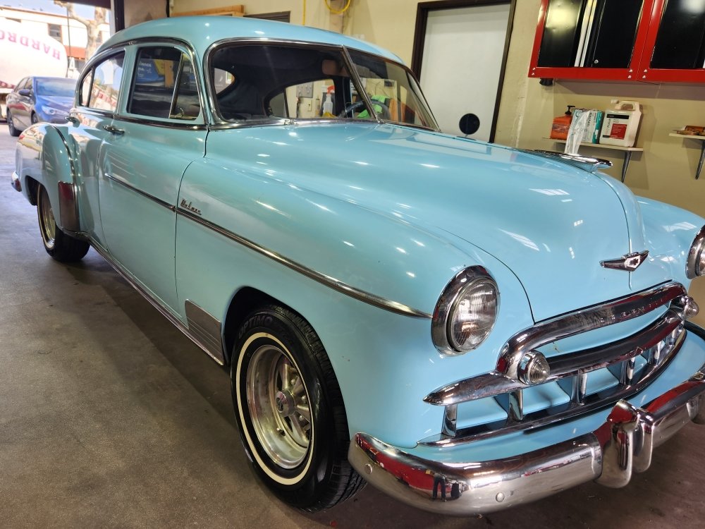 Turquoise classic Chevrolet in the shop