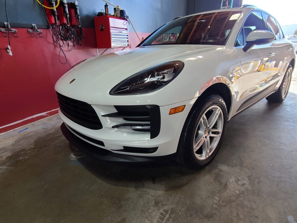 White Porsche Macan at the shop