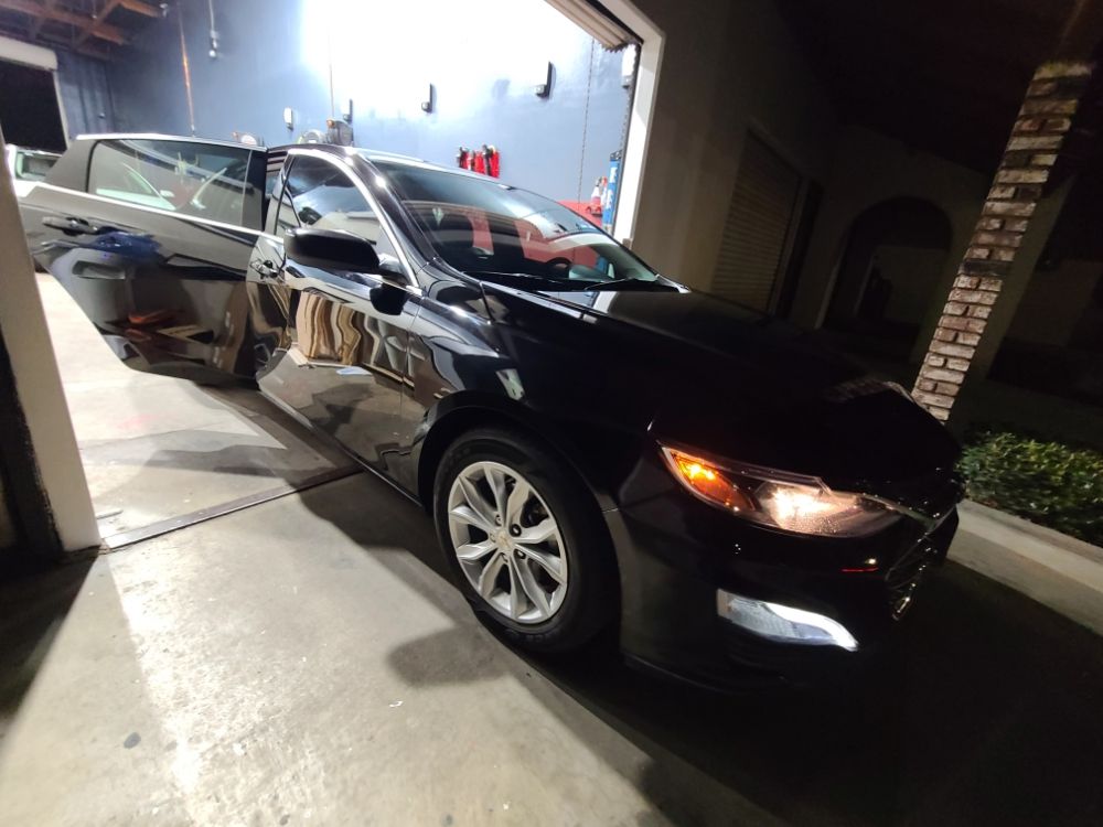 Vehicle with freshly installed window tint at the shop